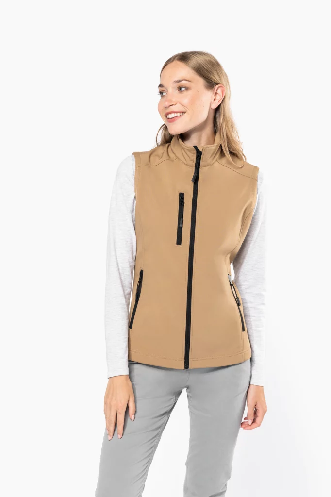 k404 - dames softshell bodywarmer ontwerpen en bedrukken -